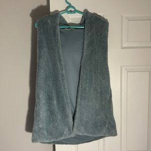 Fuzzy hooded vest with pockets!